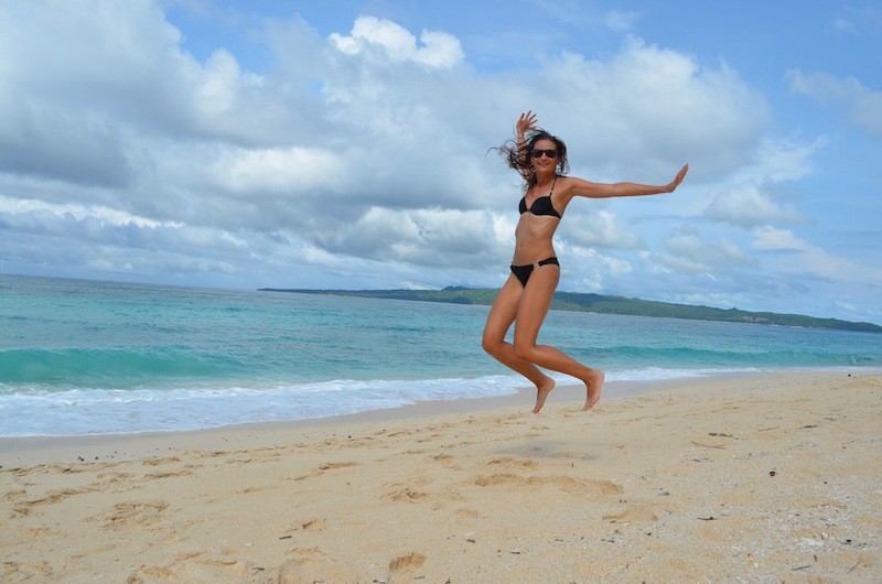 Alexandra jumping for joy in Puka Beach, Boracay