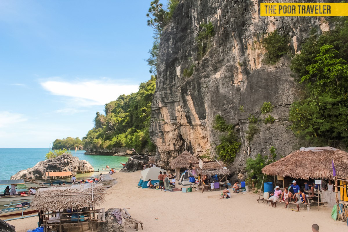 Huts at the foot of the cliffs