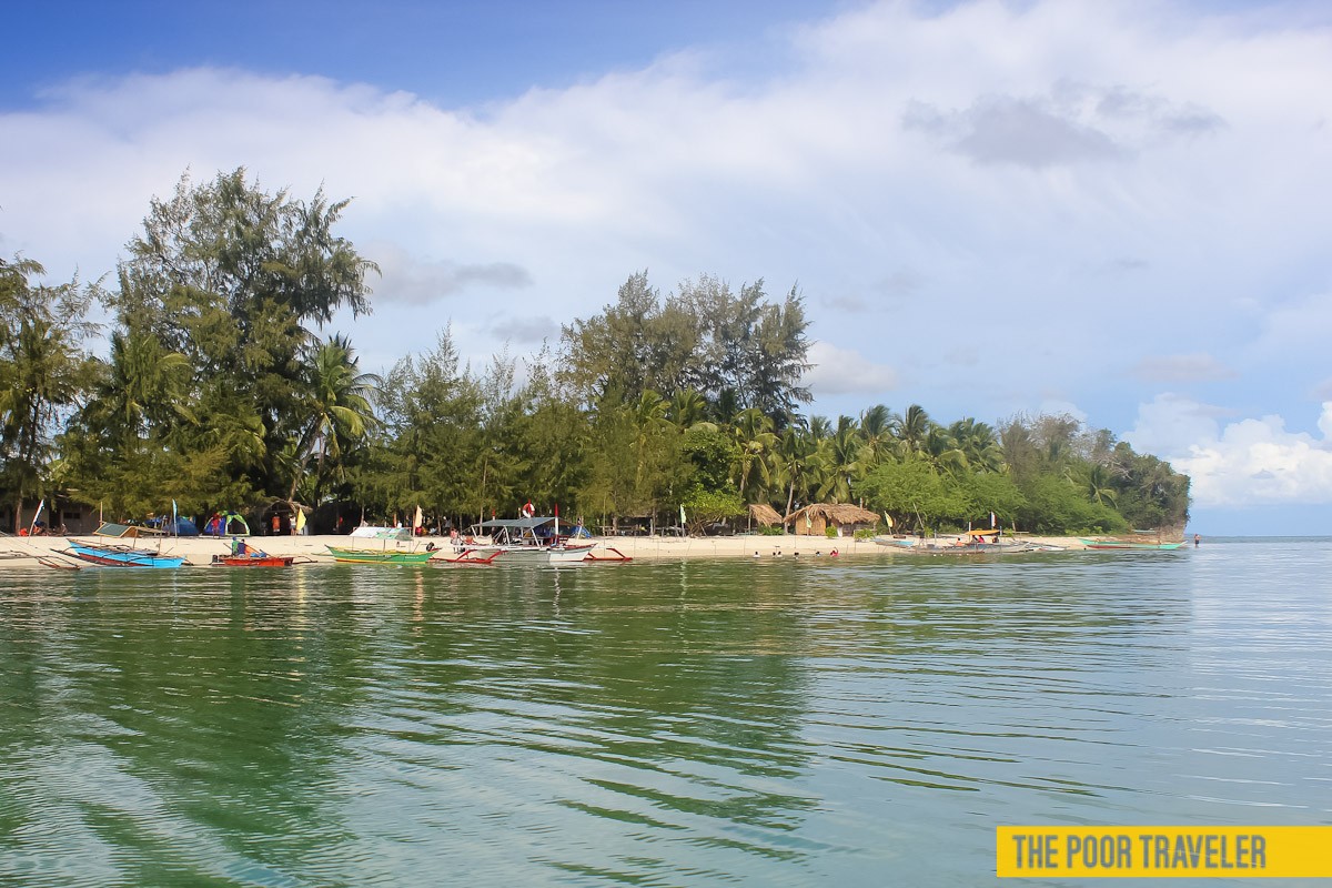 Dampalitan Island is covered with agoho (sea pine) and coconut trees.